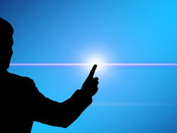 Blog Internet der Dinge - Bild Fingerzeig auf einen strahlenden Punkt
