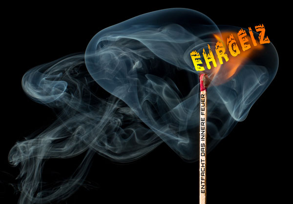 Frantum Blog Ehrgeiz das innere Feuer - Bild motivieren angezündetes Streichholz mit Schriftzug "Entfacht das Innere Feuer Ehrgeiz